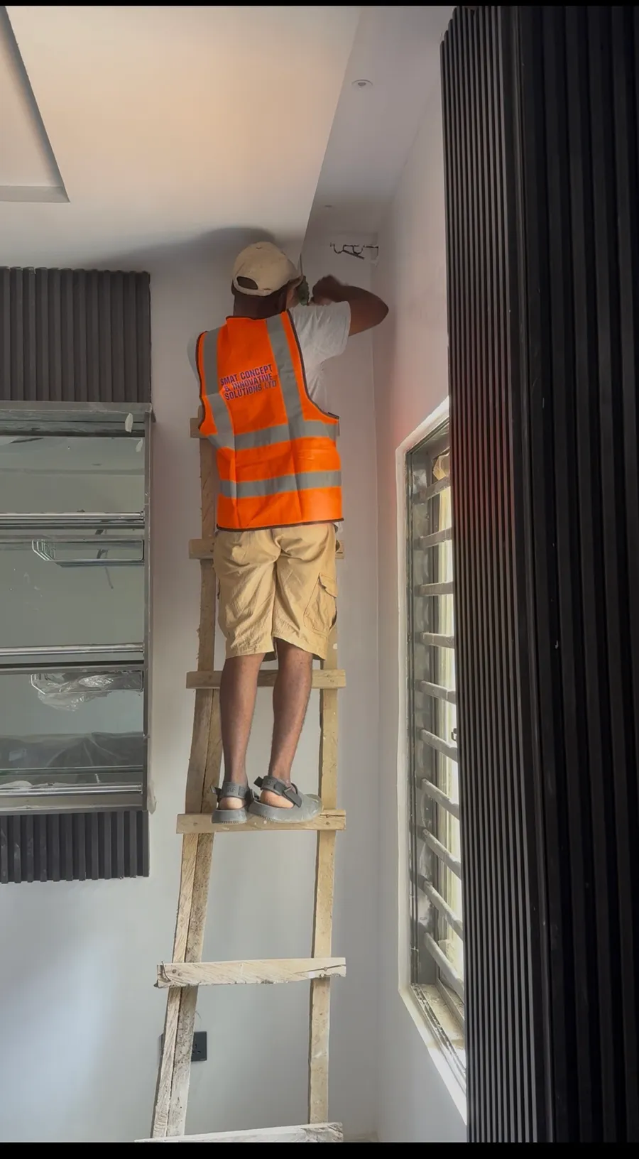 SMAT Concept technician running CCTV cabling at ceiling level